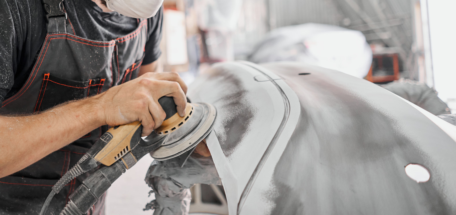 Person buffing a car