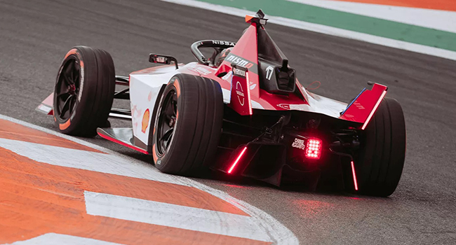 Back view of Formula E race car on track